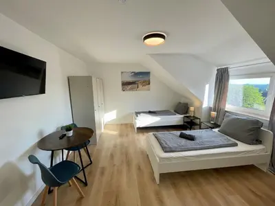 Ein Bett oder Betten in einem Zimmer der Unterkunft Moderne Monteur- und Familienwohnung auf Zeit in Remscheid Süd