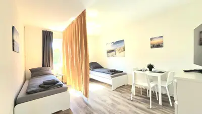 Ein Bett oder Betten in einem Zimmer der Unterkunft Modern 2-Room Apartment with Free Parking & Free Wi-Fi in Iserlohn - SW01