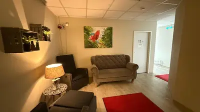 Ein Sitzbereich in der Unterkunft Monteur-Zimmer Winter