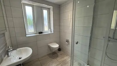 Ein Badezimmer in der Unterkunft Monteur-Zimmer Winter