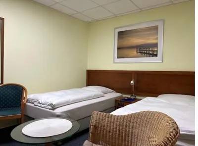 Ein Bett oder Betten in einem Zimmer der Unterkunft Monteur-Zimmer Winter