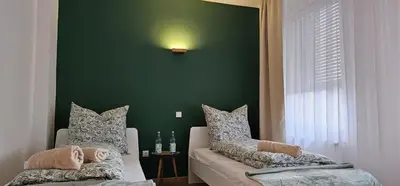 Ein Bett oder Betten in einem Zimmer der Unterkunft Dimi Living Oberhausen & mit Küche