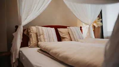 Ein Bett oder Betten in einem Zimmer der Unterkunft Wellness Paradise mit Whirlpool