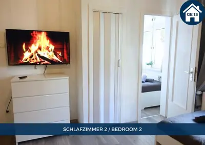 TV/Unterhaltungsangebot in der Unterkunft RtR Gelsenkirchen - Bis 10 Personen - Einzelzimmer - Voll ausgestattet - Garten - SMART TV - WIFI