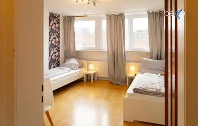 Ein Bett oder Betten in einem Zimmer der Unterkunft BEGE APARTMENTS ProWork Living
