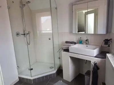 Ein Badezimmer in der Unterkunft FeWo Overberge