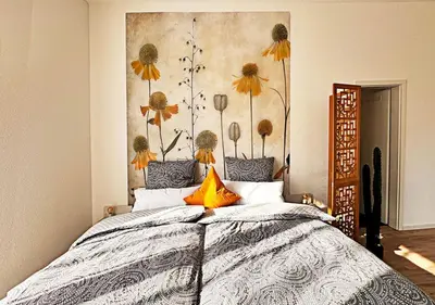 Ein Bett oder Betten in einem Zimmer der Unterkunft Neues Ruhrtal Apartment 5 mit Klimaanlage und Balkon