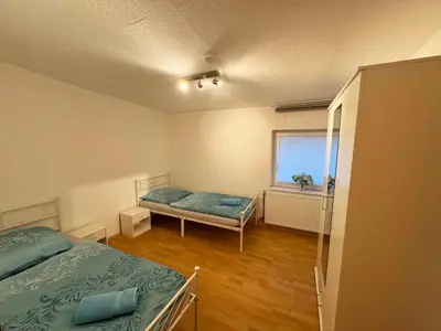 Ein Bett oder Betten in einem Zimmer der Unterkunft Scenic House in Solingen