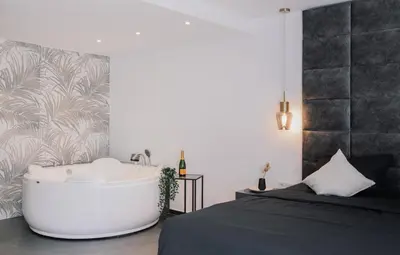 Ein Bett oder Betten in einem Zimmer der Unterkunft Boutiquehotel Reuter GmbH