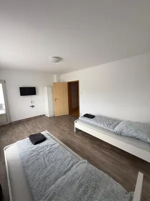 Ein Bett oder Betten in einem Zimmer der Unterkunft estrella24 LIVING ROOMS Antalya