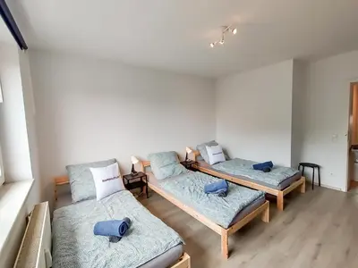 Ein Bett oder Betten in einem Zimmer der Unterkunft homes of ruhr - Monteurwohnung Halde