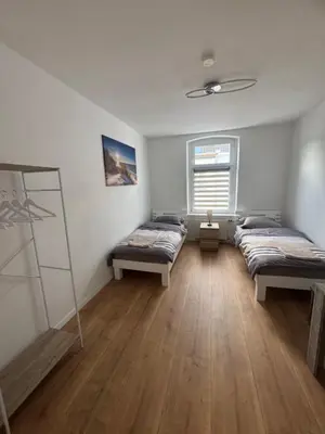Ein Bett oder Betten in einem Zimmer der Unterkunft DERKO Apart 2