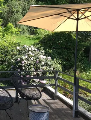Ein Garten an der Unterkunft Wohnung im Grünen cottage33