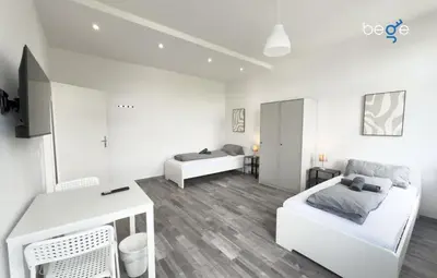 Ein Bett oder Betten in einem Zimmer der Unterkunft BEGE APARTMENTS SmartLiving