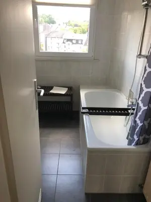 Ein Badezimmer in der Unterkunft HagenStay Mittelstadt 1