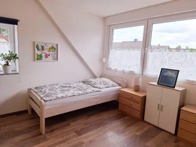 Ein Bett oder Betten in einem Zimmer der Unterkunft Marlerei