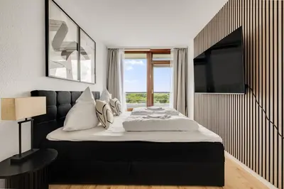 Ein Bett oder Betten in einem Zimmer der Unterkunft Beyond Living Horizon