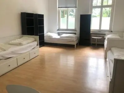 Ein Bett oder Betten in einem Zimmer der Unterkunft Hostel Apartment Monteurzimmer Solingen