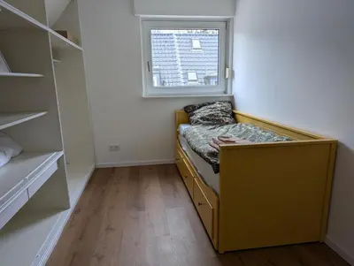 Ein Bett oder Betten in einem Zimmer der Unterkunft Cozy attic apartment