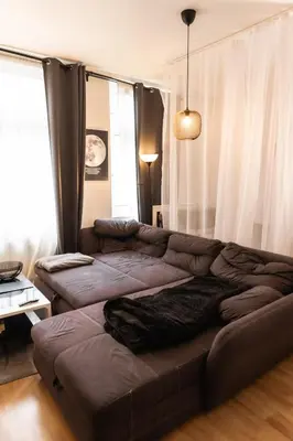 Ein Sitzbereich in der Unterkunft M House HA City Komfort Zimmer & Self Check-in