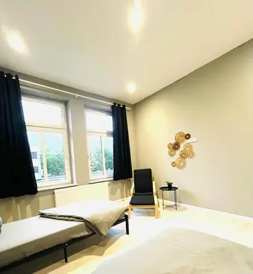 Ein Bett oder Betten in einem Zimmer der Unterkunft City Wohnung Dortmund Zentral 89-9