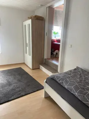 Ein Bett oder Betten in einem Zimmer der Unterkunft Ferienwohnung Monteurwohnung