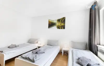Ein Bett oder Betten in einem Zimmer der Unterkunft BEGE APARTMENTS Work Zen