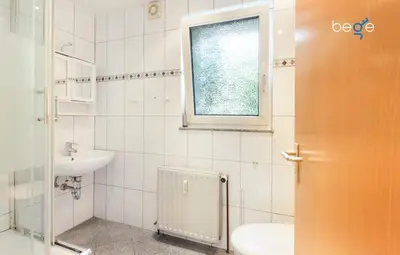 Ein Badezimmer in der Unterkunft BEGE APARTMENTS Work Zen
