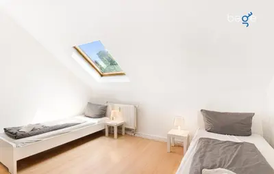 Ein Bett oder Betten in einem Zimmer der Unterkunft BEGE APARTMENT Cozy Workbase