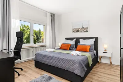 Ein Bett oder Betten in einem Zimmer der Unterkunft MOLA Apartments-Stylisches Apartment in Wetter-im Ruhrgebiet-für 3 Gäste-WLAN