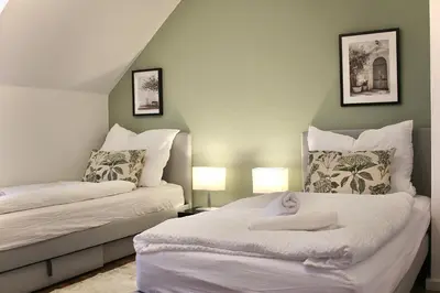 Ein Bett oder Betten in einem Zimmer der Unterkunft 3-Zimmer-Apartment I 2 Min bis Hbf I Smart TV I WiFi I modern