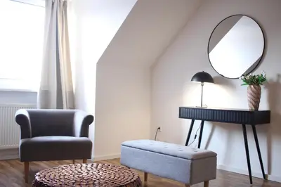 Ein Sitzbereich in der Unterkunft 3-Zimmer-Apartment I 2 Min bis Hbf I Smart TV I WiFi I modern