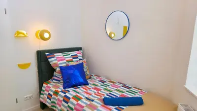 Ein Bett oder Betten in einem Zimmer der Unterkunft Blumenhof Duisburg HBF
