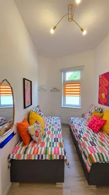 Ein Bett oder Betten in einem Zimmer der Unterkunft Blumenhof Duisburg HBF