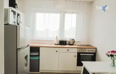 Küche/Küchenzeile in der Unterkunft BEGE APARTMENTS Remote Base