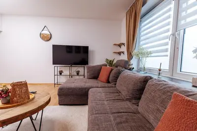 Ein Sitzbereich in der Unterkunft classic & cream - Netflix - WIFI - City - 4 Person