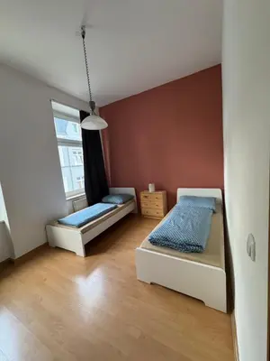 Ein Bett oder Betten in einem Zimmer der Unterkunft DownTown Appartement Monteurs Ferienunterkunft