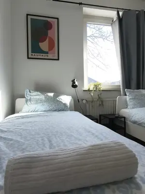 Ein Bett oder Betten in einem Zimmer der Unterkunft Working Professionals Flat