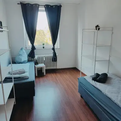 Ein Bett oder Betten in einem Zimmer der Unterkunft Monteurwohnung Ferienwohnung Duisburg Grenze Düsseldorf