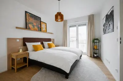 Ein Bett oder Betten in einem Zimmer der Unterkunft LIVELY am Kaiserberg Duisburg