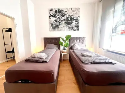Ein Bett oder Betten in einem Zimmer der Unterkunft Zentrales Apartment mit Küche und Wlan, Nähe Essen Messe und Hbf