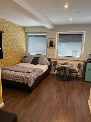 Ein Bett oder Betten in einem Zimmer der Unterkunft Tondose Apartment