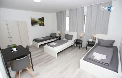 Ein Bett oder Betten in einem Zimmer der Unterkunft BEGE APARTMENTS ComfyStay