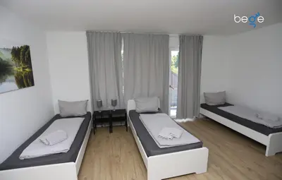 Ein Bett oder Betten in einem Zimmer der Unterkunft BEGE APARTMENTS ComfyStay