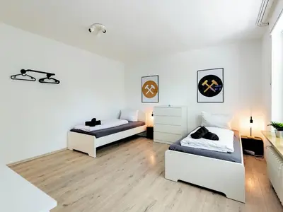 Ein Bett oder Betten in einem Zimmer der Unterkunft 3 BR Nice Apartment Gelsenkirchen