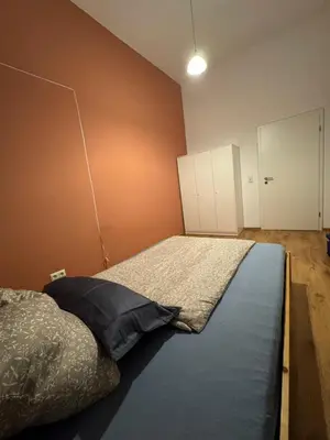 Ein Bett oder Betten in einem Zimmer der Unterkunft Royal Appartement Ferien Monteursunterkunft