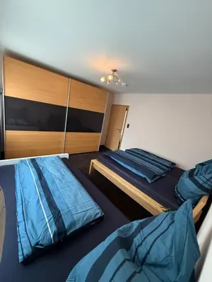 Ein Bett oder Betten in einem Zimmer der Unterkunft CAL Apartments
