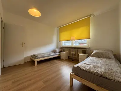 Ein Bett oder Betten in einem Zimmer der Unterkunft City-Apartment Monteur- & Ferienwohnung