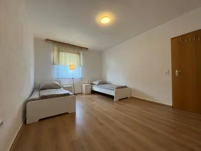 Ein Bett oder Betten in einem Zimmer der Unterkunft City-Apartment Monteur- & Ferienwohnung