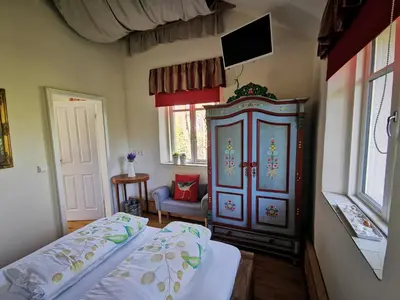Ein Bett oder Betten in einem Zimmer der Unterkunft HR Cottage am Honigbach